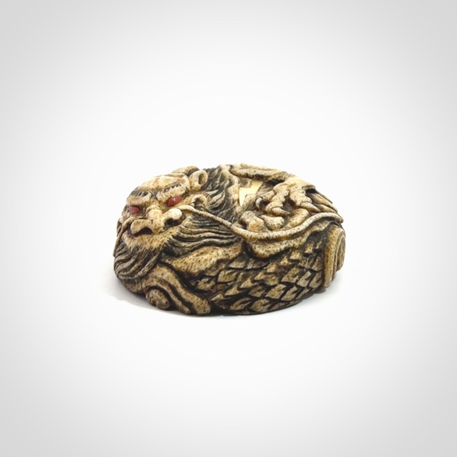 Hand carved red eyed dragon in the clouds made from Deer antler Crown with Mother of Pearl and Gold Leaf. Hand made by master bone carver Fumio Noguchi. Spectacular collectable work of art to display. One only, delivered to you at no extra cost with express courier.