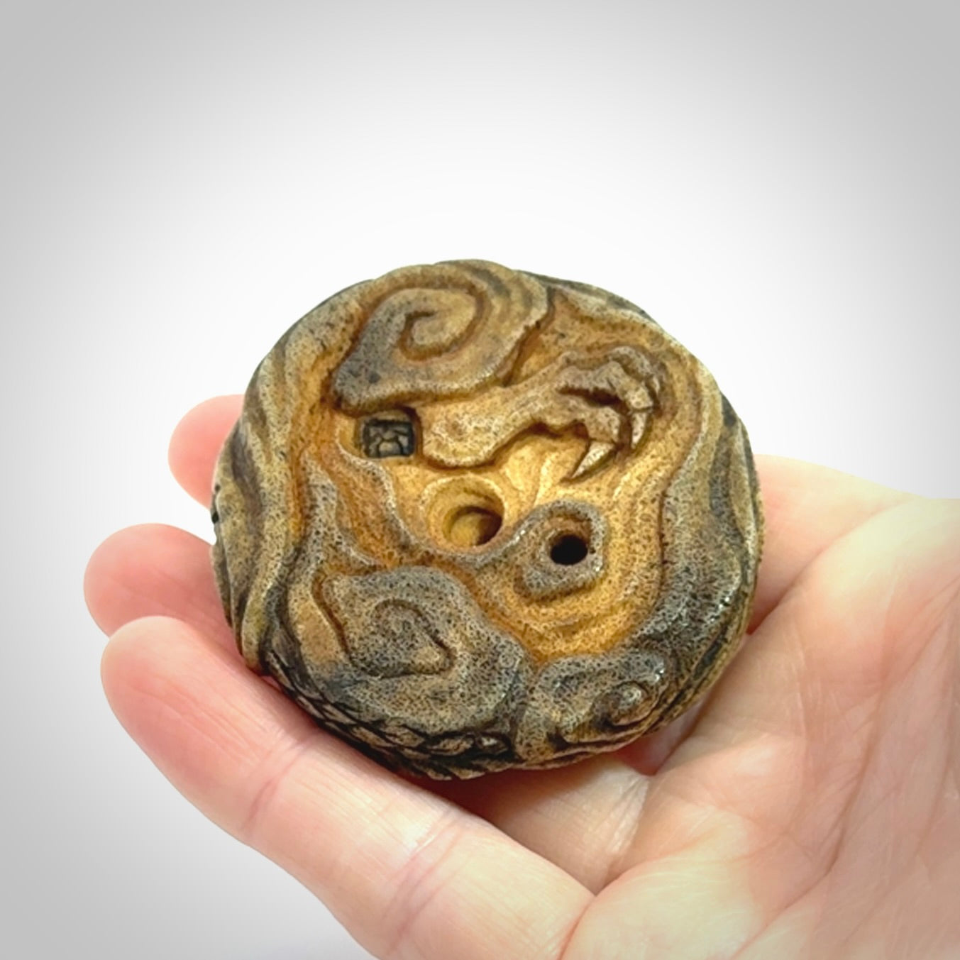 Hand carved red eyed dragon in the clouds made from Deer antler Crown with Mother of Pearl and Gold Leaf. Hand made by master bone carver Fumio Noguchi. Spectacular collectable work of art to display. One only, delivered to you at no extra cost with express courier.