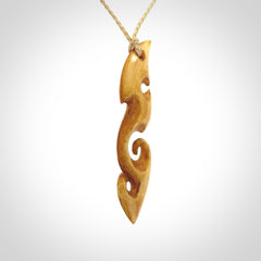 This is a wonderful, contemporary large koru from stained bone. Hand carved and provided with an adjustable oat cord.