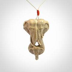 This is a triple elephant pendant, carved in a Deer Antler. The cord is length adjustable. Provided in a woven kete pouch and delivered with express courier.