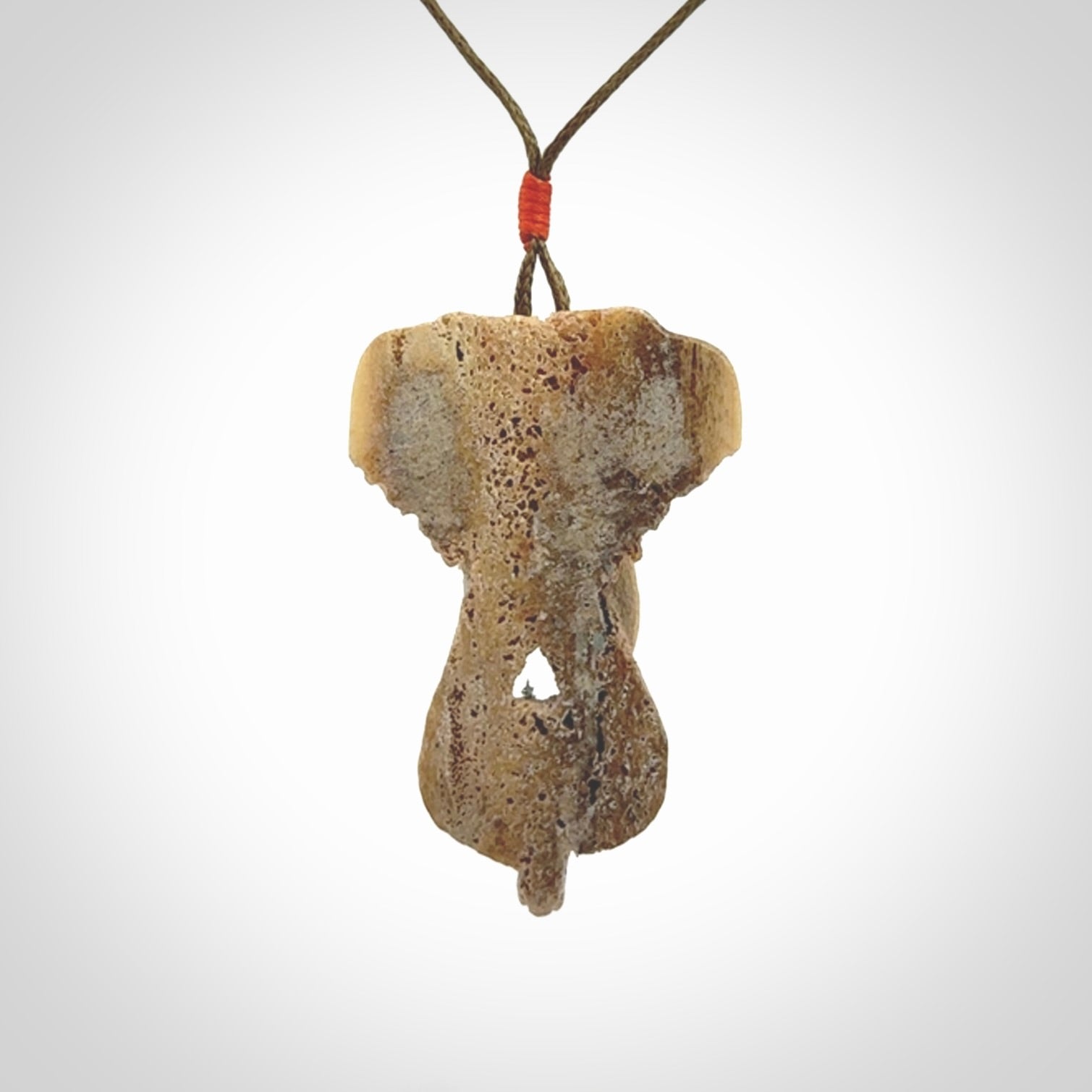 This is a triple elephant pendant, carved in a Deer Antler. The cord is length adjustable. Provided in a woven kete pouch and delivered with express courier.