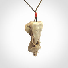 This is a triple elephant pendant, carved in a Deer Antler. The cord is length adjustable. Provided in a woven kete pouch and delivered with express courier.