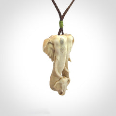 This is a triple elephant pendant, carved in a Deer Antler. The cord is length adjustable. Provided in a woven kete pouch and delivered with express courier.