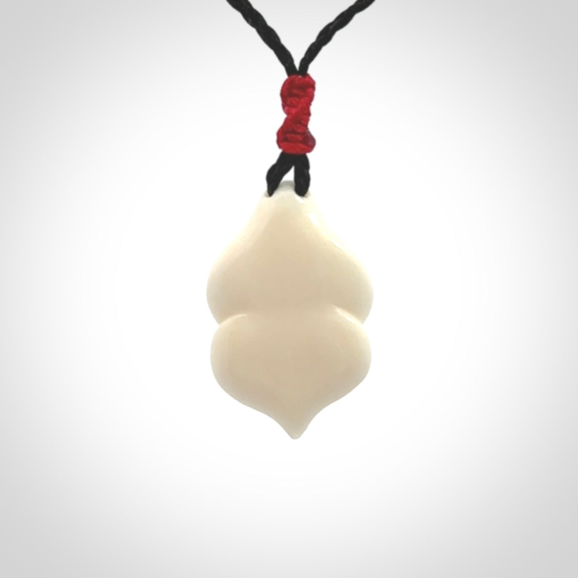 Hand carved goddess pendant. Venus of Willendorf pendant carved in bone. Made by NZ Pacific. Bone jewellery for sale online.
