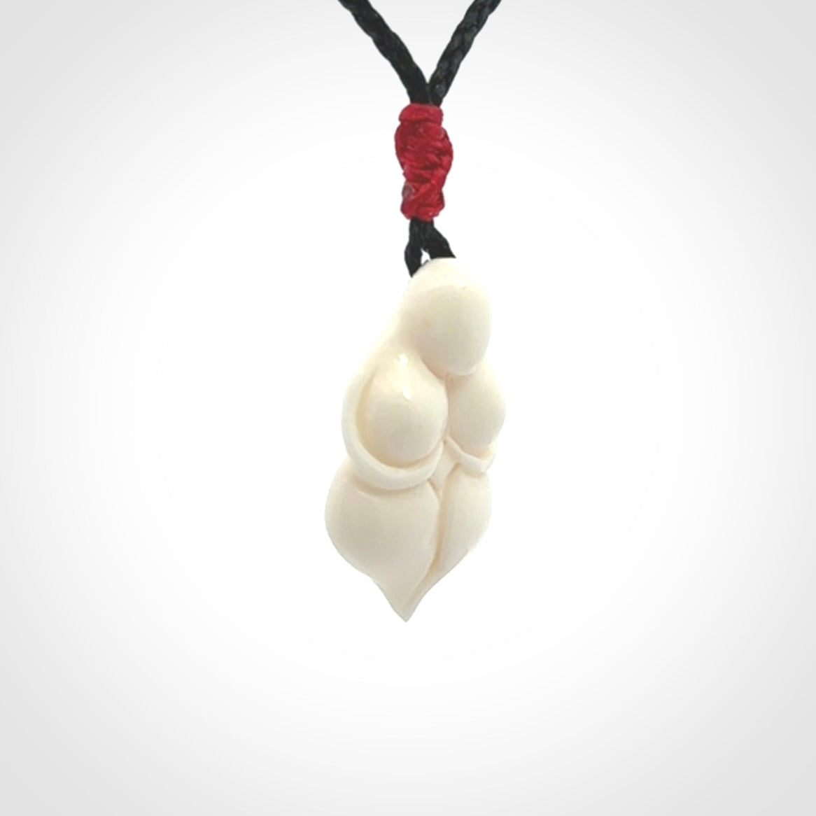 Hand carved goddess pendant. Venus of Willendorf pendant carved in bone. Made by NZ Pacific. Bone jewellery for sale online.