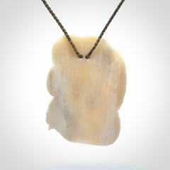 Hand carved bone snake skull pendant. Hand carved by NZ Pacific. Free postage worldwide. Hand made snake with skull necklace from bone. Snake skull necklace for men and women.