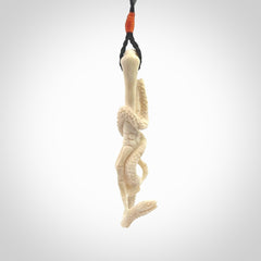 Hand carved deer antler skeleton hand with snake pendant. Hand carved by NZ Pacific. Free postage worldwide. Hand made skeleton hand with snake necklace from deer antler. Skeleton hand with snake necklace for men and women.