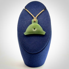 Hand carved New Zealand jade dog whistle. Carved for NZ Pacific by master carver Ross Crump. Jade dog whistle pendant provided with adjustable cord and delivered with express courier.