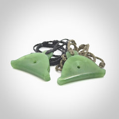 Hand carved New Zealand jade dog whistle. Carved for NZ Pacific by master carver Ross Crump. Jade dog whistle pendant provided with adjustable cord and delivered with express courier.