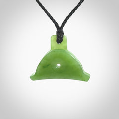 Hand carved New Zealand jade dog whistle. Carved for NZ Pacific by master carver Ross Crump. Jade dog whistle pendant provided with adjustable cord and delivered with express courier.