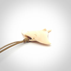 Woolly mammoth tusk manta ray pendant. Hand carved Mammoth Tusk manta ray pendant. Provided with adjustable cord.