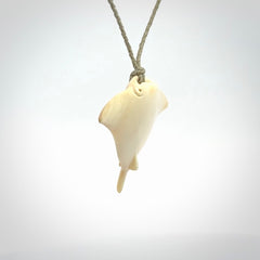 Woolly mammoth tusk manta ray pendant. Hand carved Mammoth Tusk manta ray pendant. Provided with adjustable cord.