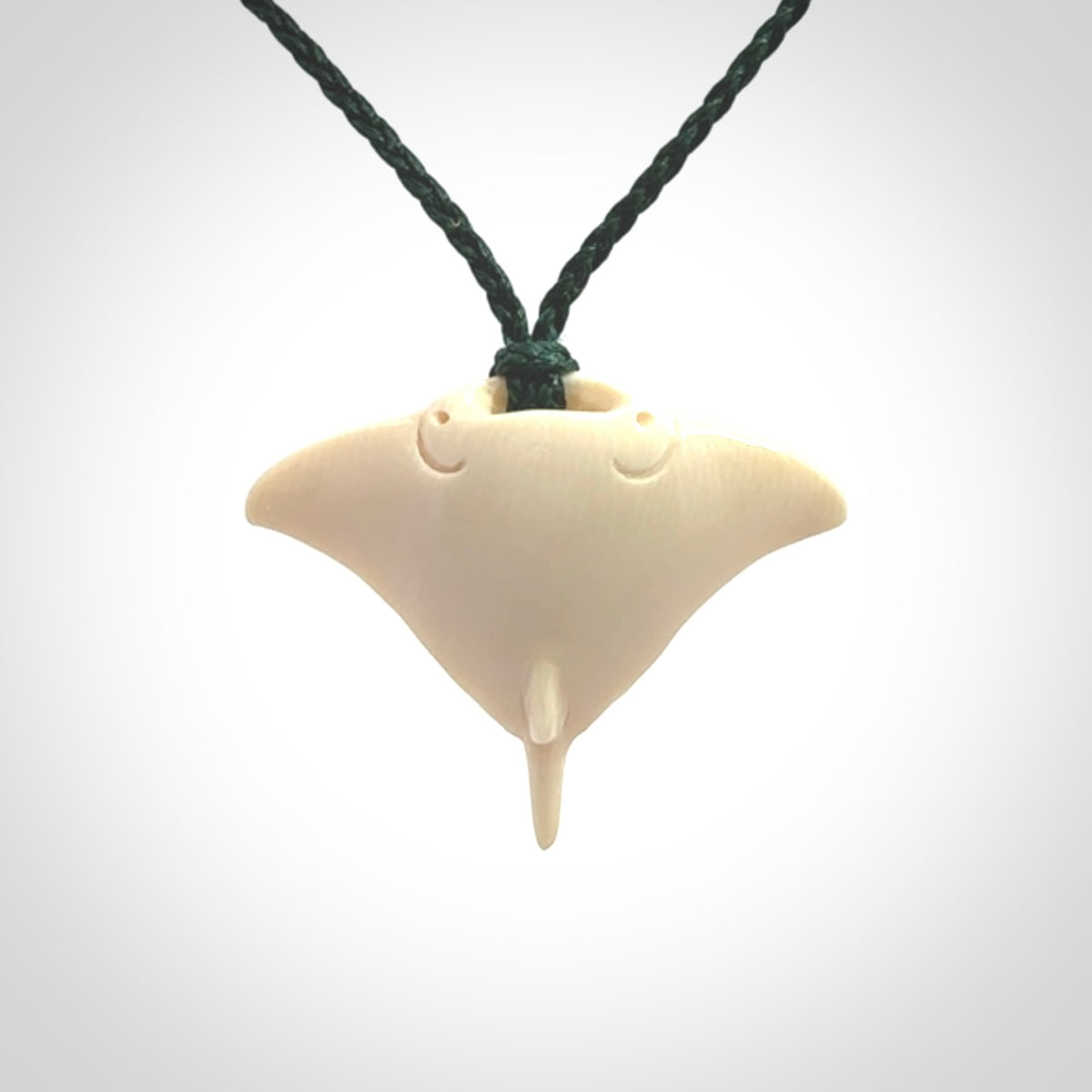 Woolly mammoth tusk manta ray pendant. Hand carved Mammoth Tusk manta ray pendant. Provided with adjustable cord.