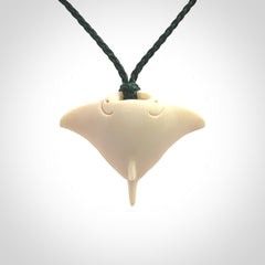 Woolly mammoth tusk manta ray pendant. Hand carved Mammoth Tusk manta ray pendant. Provided with adjustable cord.