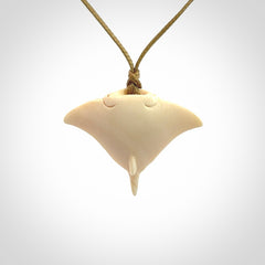 Woolly mammoth tusk manta ray pendant. Hand carved Mammoth Tusk manta ray pendant. Provided with adjustable cord.
