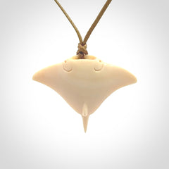 Woolly mammoth tusk manta ray pendant. Hand carved Mammoth Tusk manta ray pendant. Provided with adjustable cord.