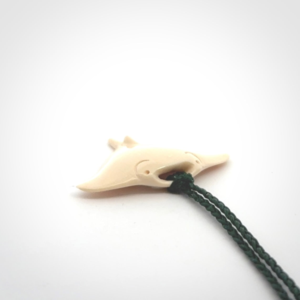 Woolly mammoth tusk manta ray pendant. Hand carved Mammoth Tusk manta ray pendant. Provided with adjustable cord.