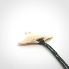 Woolly mammoth tusk manta ray pendant. Hand carved Mammoth Tusk manta ray pendant. Provided with adjustable cord.