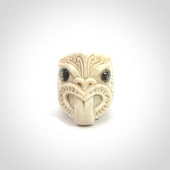 Hand carved deer antler wheku rings with paua shell eyes.