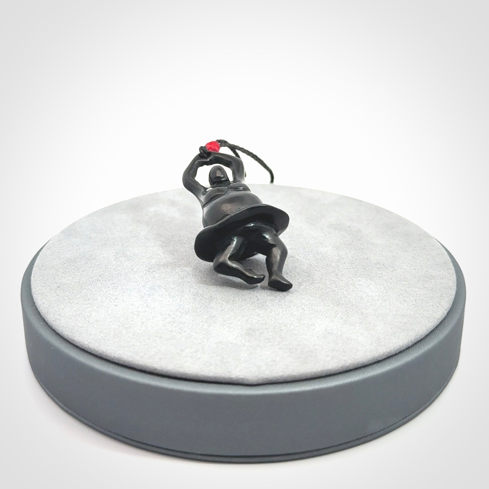 Hand carved Black jade ballet dancer pendant. Hand carved by NZ Pacific. Black Jade jewellery for sale online. Ballerina pendant that is provided on a black adjustable cord and packaged in a woven kete pouch.
