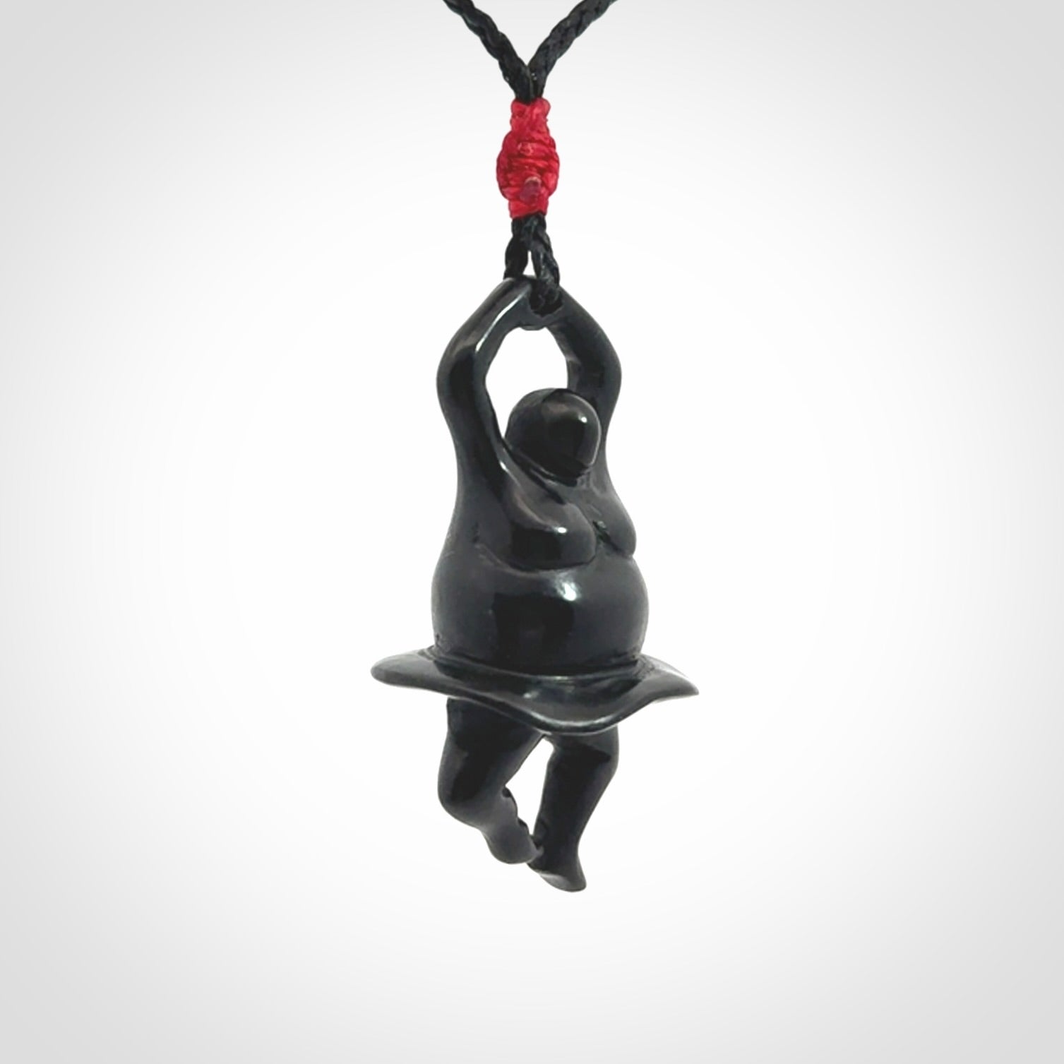 Hand carved Black jade ballet dancer pendant. Hand carved by NZ Pacific. Black Jade jewellery for sale online. Ballerina pendant that is provided on a black adjustable cord and packaged in a woven kete pouch.