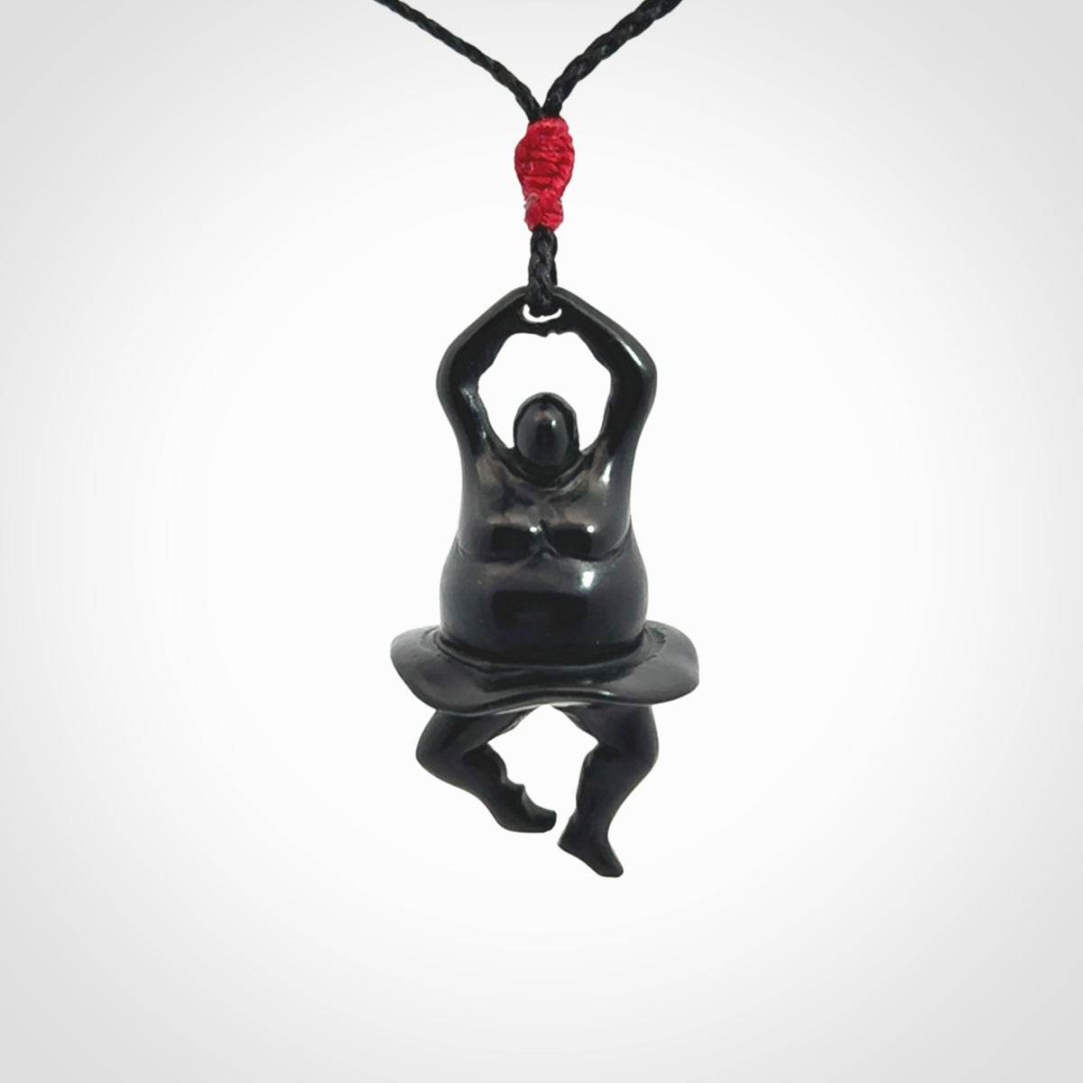 Hand carved Black jade ballet dancer pendant. Hand carved by NZ Pacific. Black Jade jewellery for sale online. Ballerina pendant that is provided on a black adjustable cord and packaged in a woven kete pouch.