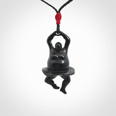 Hand carved Black jade ballet dancer pendant. Hand carved by NZ Pacific. Black Jade jewellery for sale online. Ballerina pendant that is provided on a black adjustable cord and packaged in a woven kete pouch.