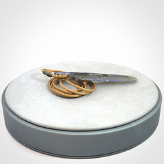 This is a hand carved feather pendant made from Labradorite stone.