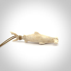 Winghead or hammerhead shark pendant. Hand carved from deer antler by NZ Pacific. Hand carved bone jewellery for sale online.