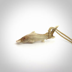 Winghead or hammerhead shark pendant. Hand carved from deer antler by NZ Pacific. Hand carved bone jewellery for sale online.