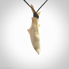 Winghead or hammerhead shark pendant. Hand carved from deer antler by NZ Pacific. Hand carved bone jewellery for sale online.