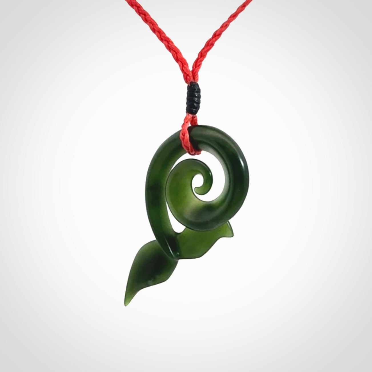 Whale tail pendant beautifully Hand Carved in New Zealand Pounamu