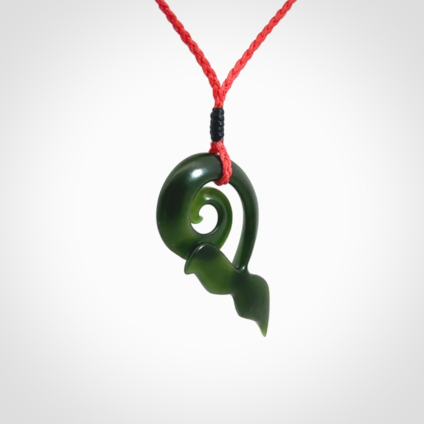 Whale tail pendant beautifully Hand Carved in New Zealand Pounamu