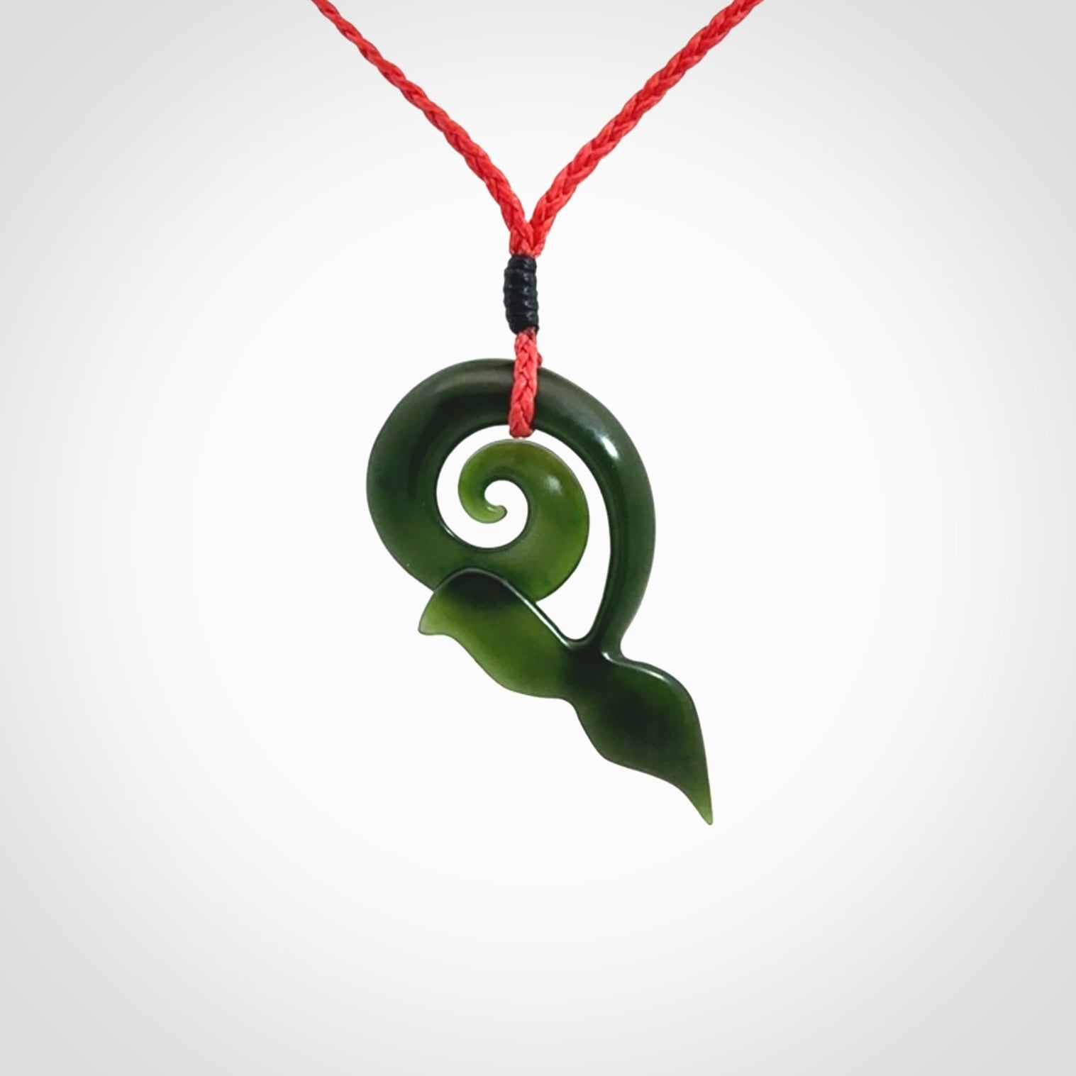 Whale tail pendant beautifully Hand Carved in New Zealand Pounamu