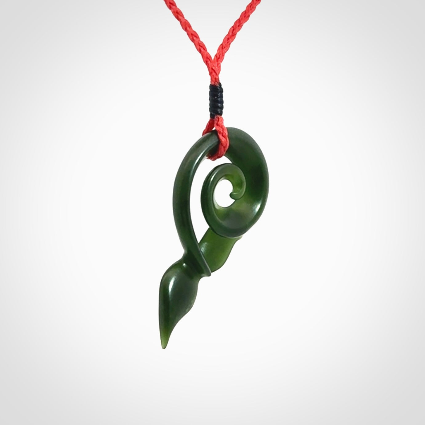 Whale tail pendant beautifully Hand Carved in New Zealand Pounamu
