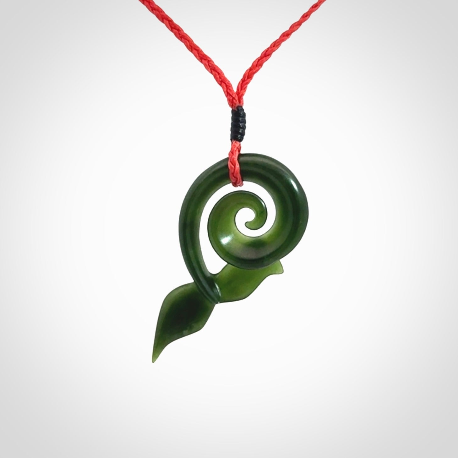 Whale tail pendant beautifully Hand Carved in New Zealand Pounamu