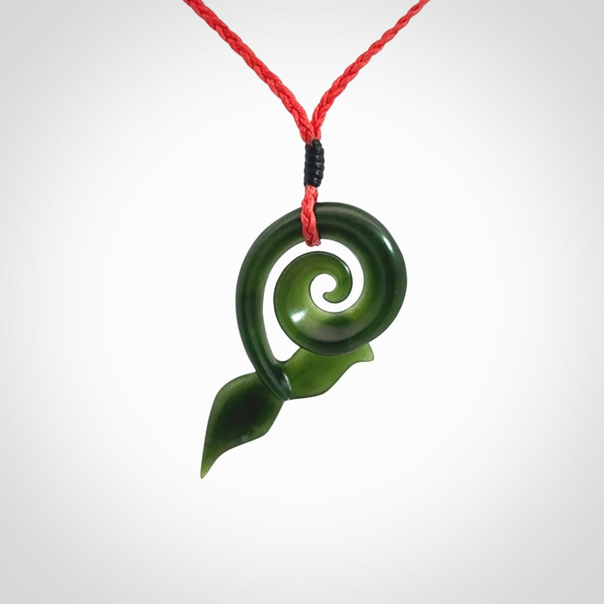 Whale tail pendant beautifully Hand Carved in New Zealand Pounamu