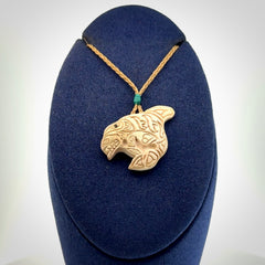 Hand carved woolly mammoth tusk pendant