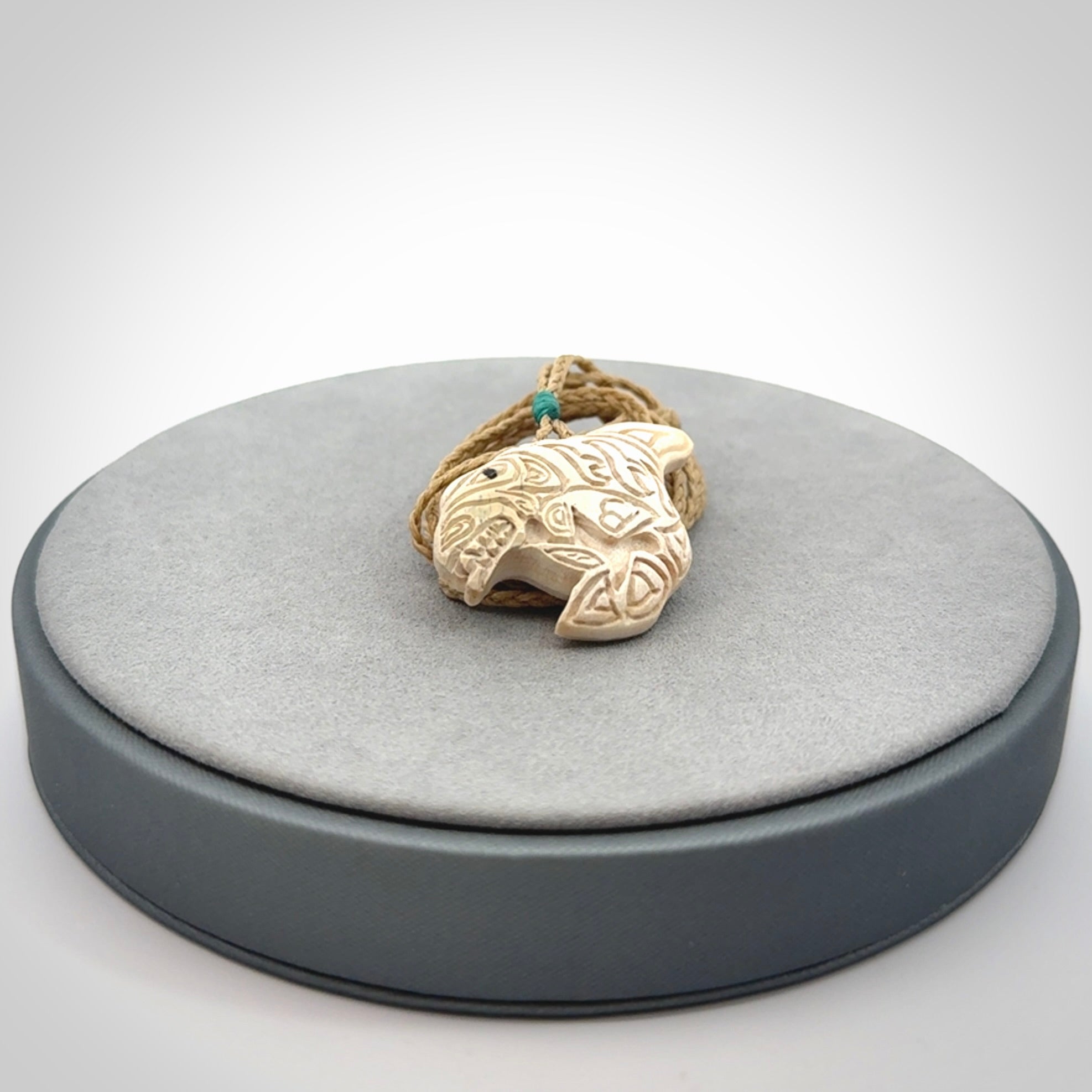Hand carved woolly mammoth tusk pendant