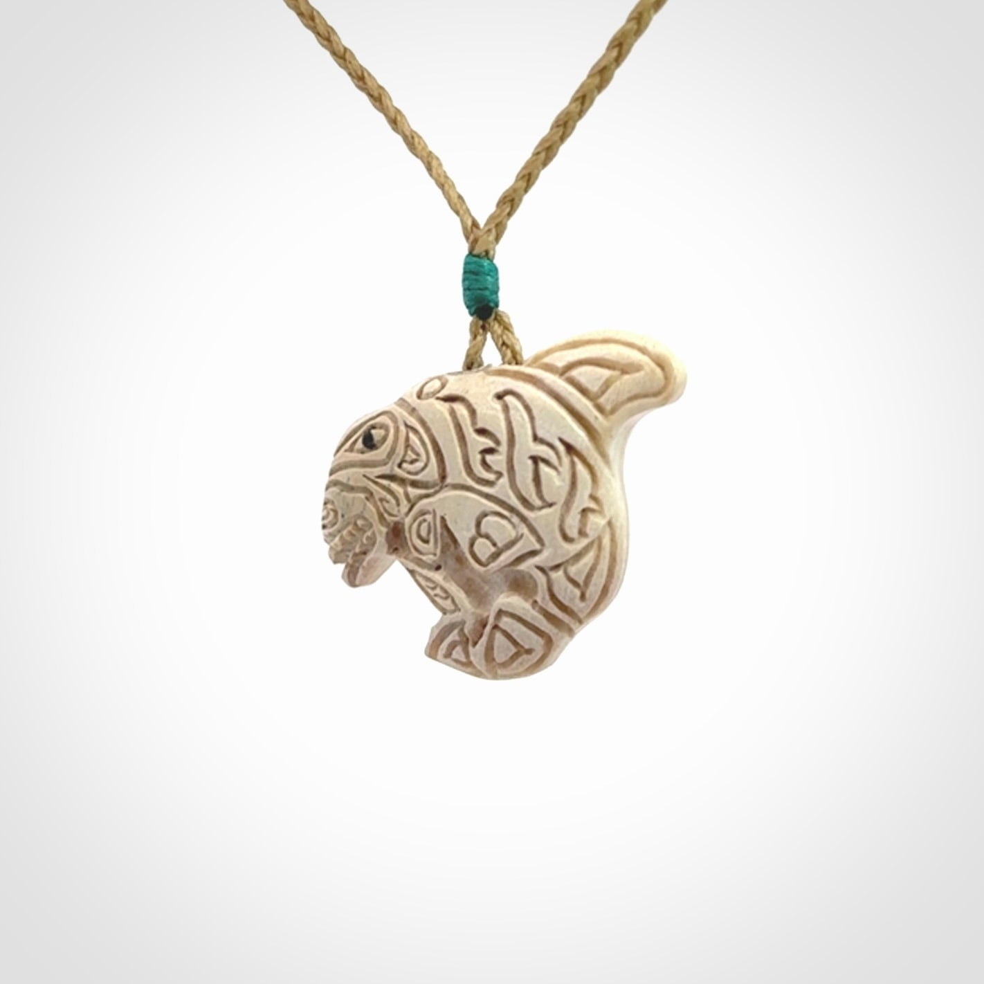Hand carved woolly mammoth tusk pendant