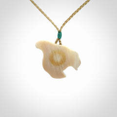 Hand carved woolly mammoth tusk pendant