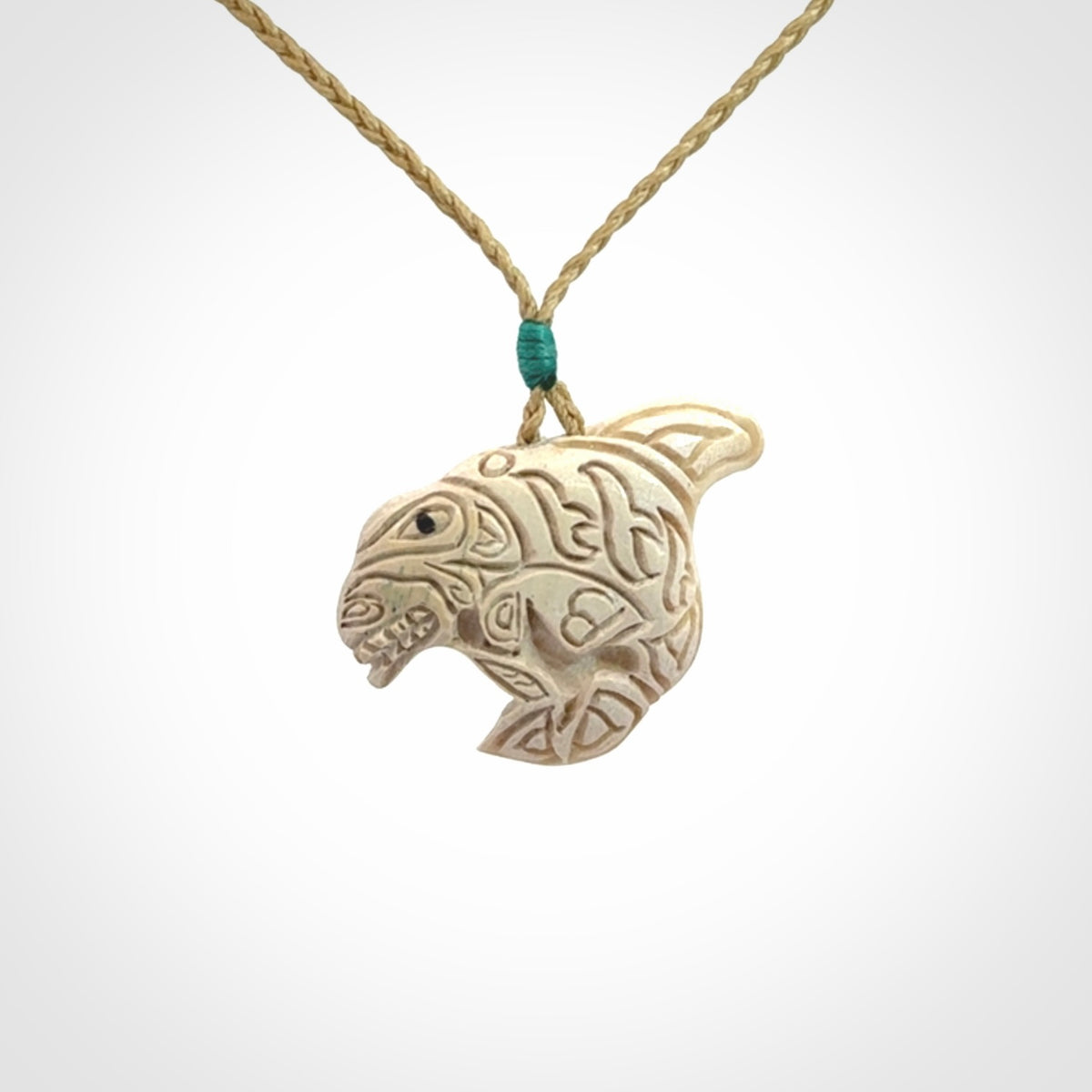 Hand carved woolly mammoth tusk pendant