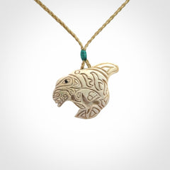 Hand carved woolly mammoth tusk pendant