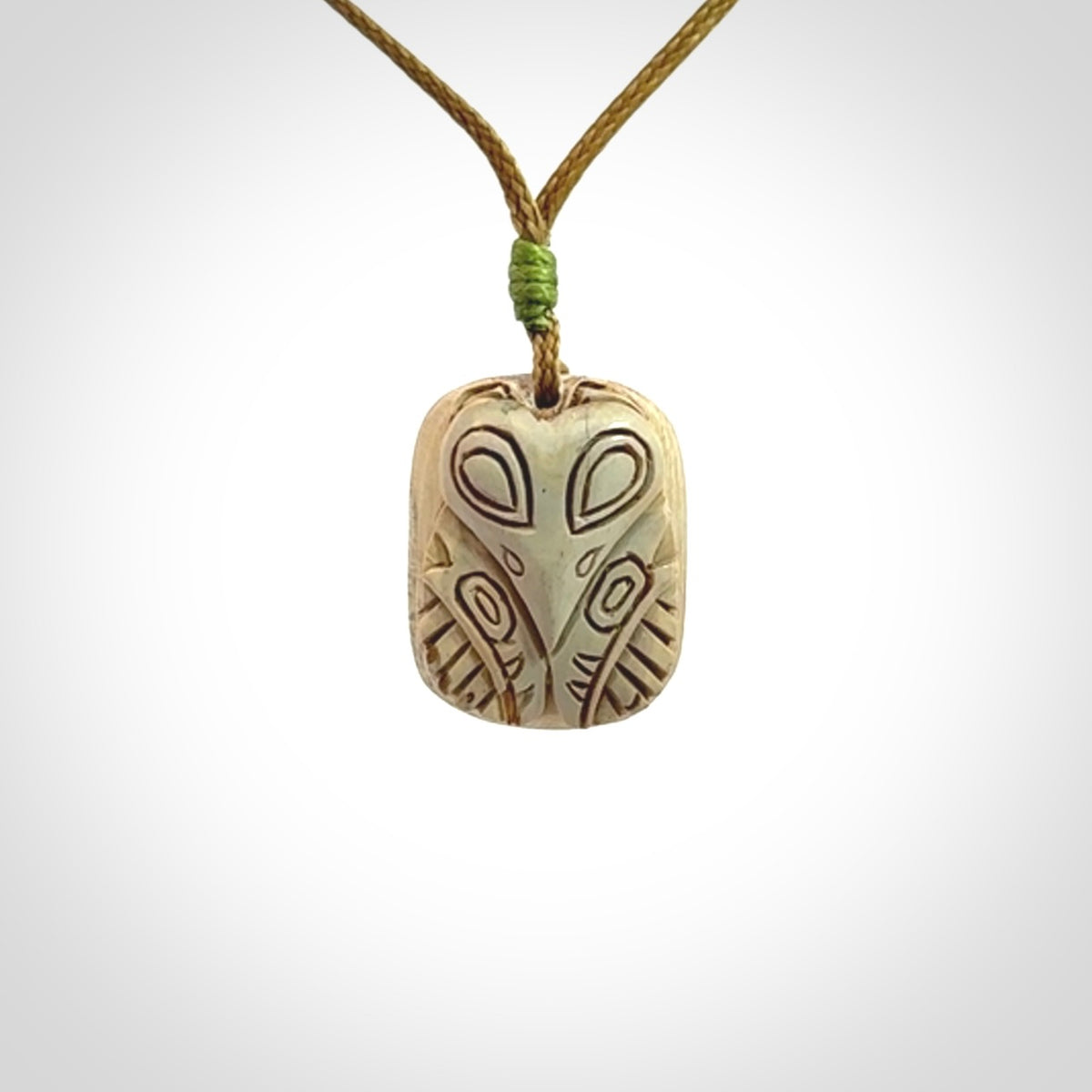 Hand carved woolly mammoth tusk pendant