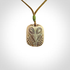 Hand carved woolly mammoth tusk pendant