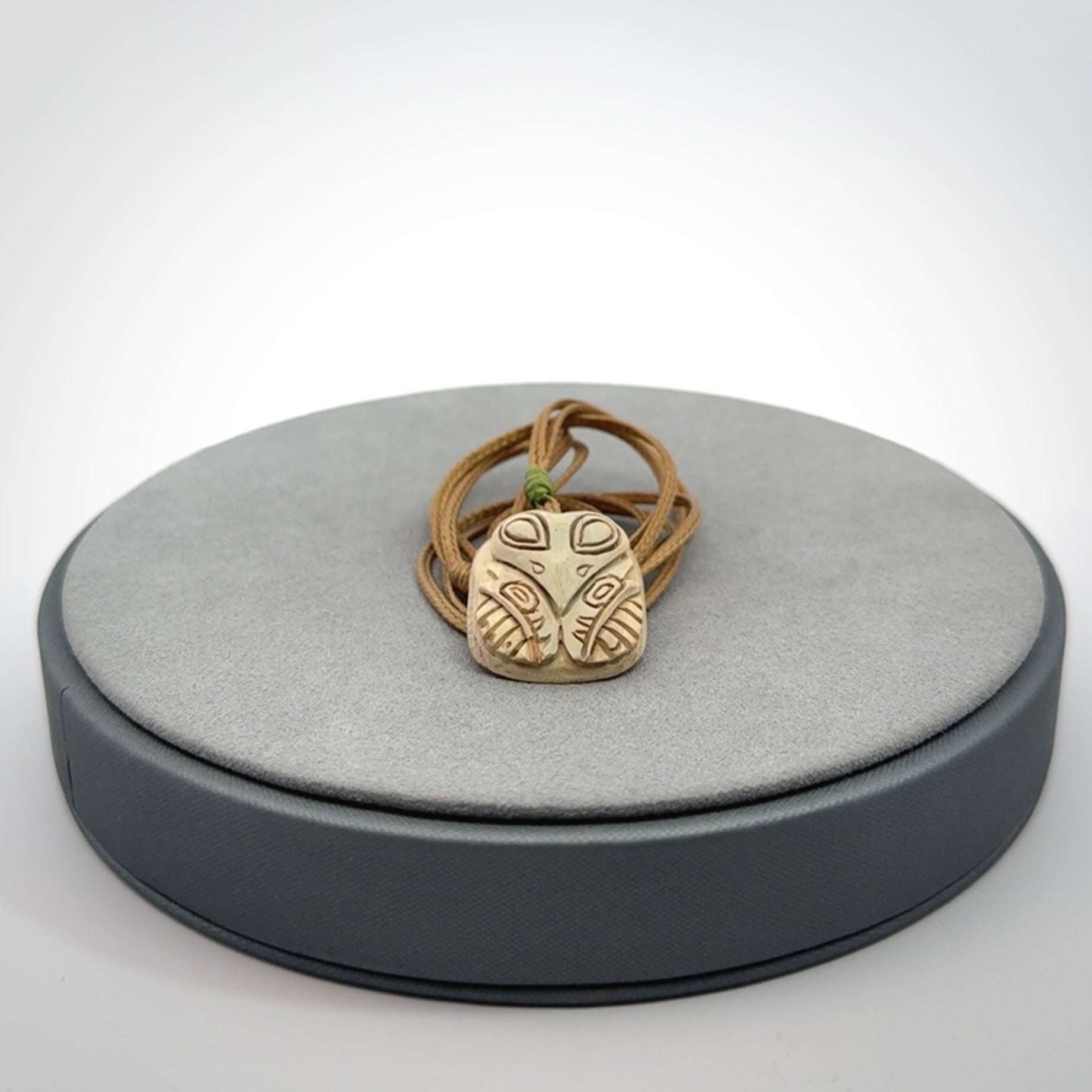 Hand carved woolly mammoth tusk pendant