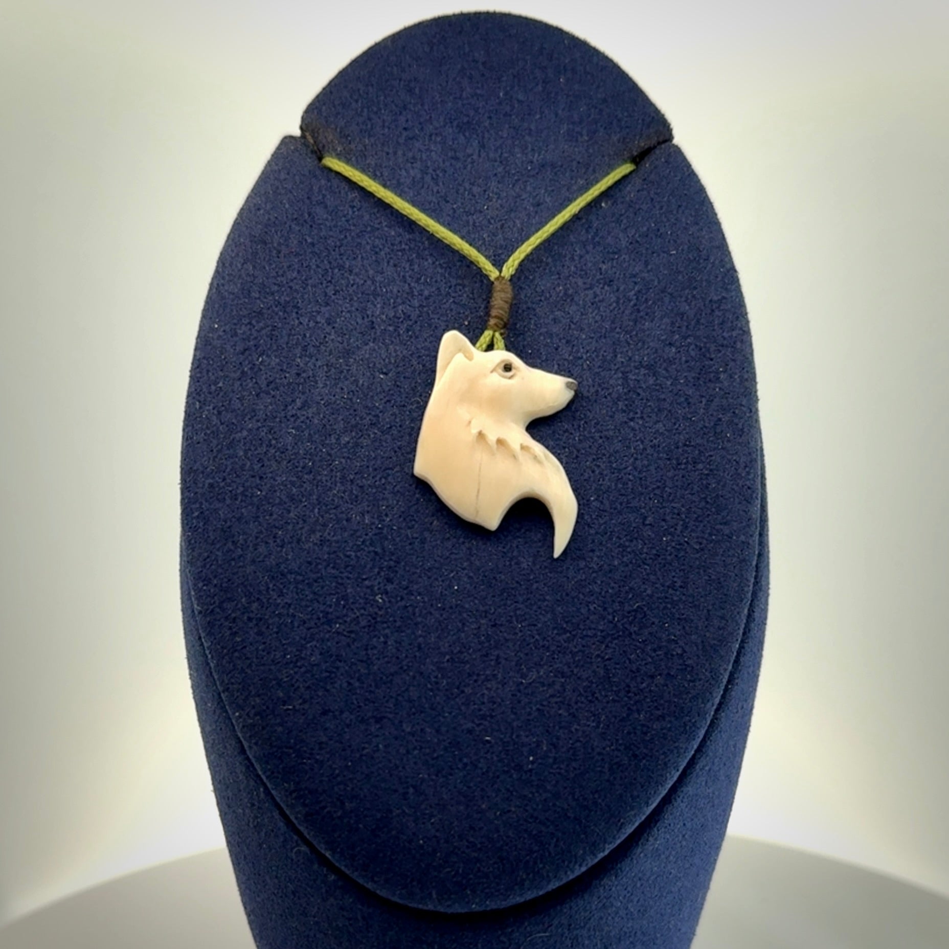 A Beautiful Small Mammoth Tusk wolf Pendant