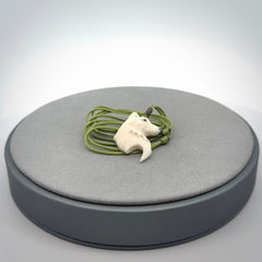 A Beautiful Small Mammoth Tusk wolf Pendant