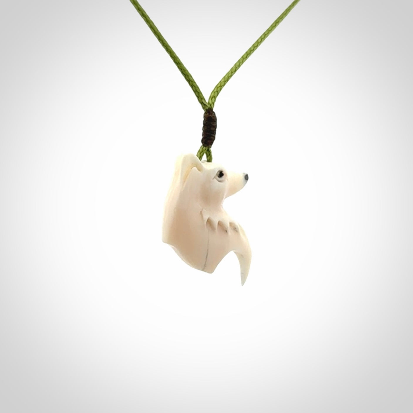 A Beautiful Small Mammoth Tusk wolf Pendant