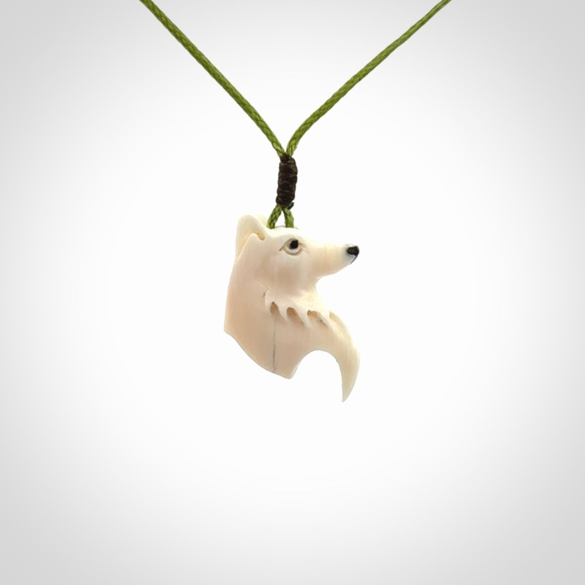 A Beautiful Small Mammoth Tusk wolf Pendant